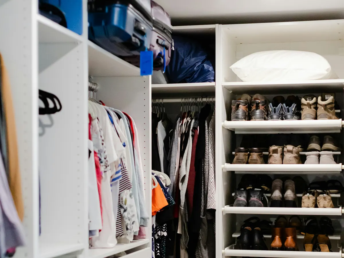 Closet shelving design with integrated vertical spaces.